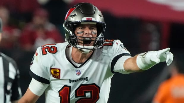 Buccaneers QB Tom Brady calls a play at the line of scrimmage